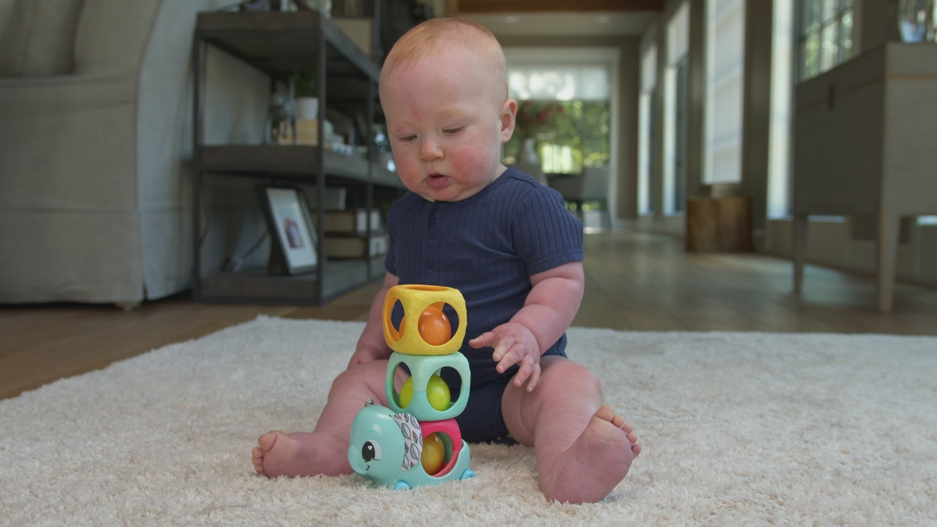 Video showing the Fat Brain Stack Rattle and Roll Toy