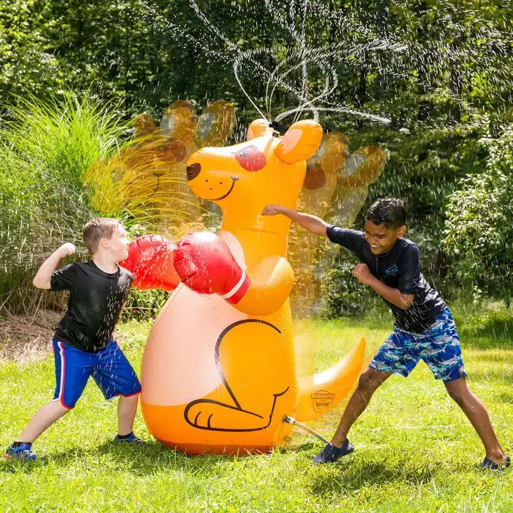 2 kids boxing with an 6 ft tall inflatable sprinkler