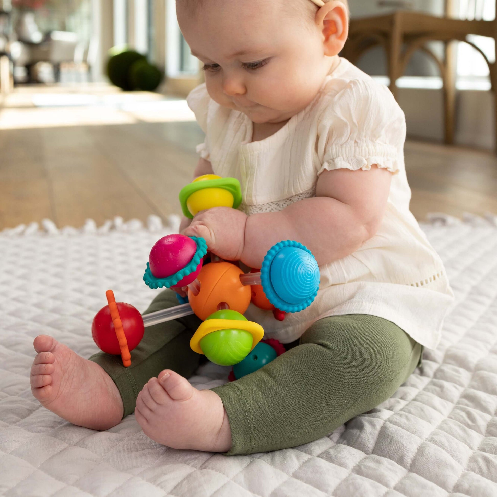 Wimzle Baby Sensory and Motor Skills Toy